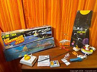 Both VertiBird sets laid out with boxes, bases, aircraft, controllers and accessories visible