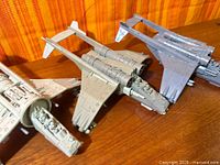 Three unpainted Vulture Gunship models showing overall assembly