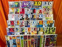 Full lot of X-O Manowar comics displayed in rows