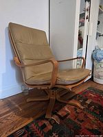 Full view of Westnofa swivel chair against wall