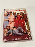 Front of slipcover showing cast photo and title