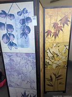 Front view showing two decorated panels with botanical prints and frame edge