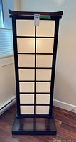 Front view of shoji floor lamp showing wood lattice and rice paper panels