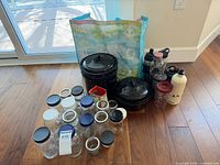 Full lot showing jars, enamel pots with lids, insulated bottles/tumblers and reusable bag