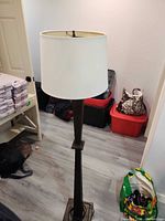 Full view of lamp showing shade, column, and base