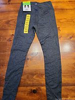 Full view of leggings front showing color, style and new tag