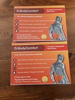 Front view of two BodyComfort 6-piece heat-pack boxes