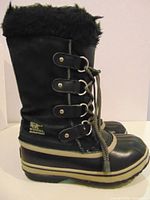Left side view of both boots showing lace system, faux fur collar and Sorel logo