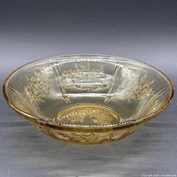 Top view of amber glass bowl showing floral rose pattern