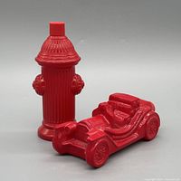 Fire hydrant and vintage car cologne bottles full view