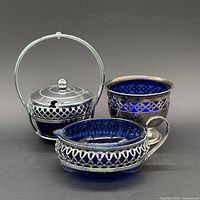 Front view of all three cobalt glass pieces in chrome mounts