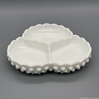 Top view showing tri-section layout and scalloped rim