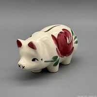 left side view showing floral design and coin slot