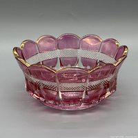Overall view of pink and clear pressed glass bowl