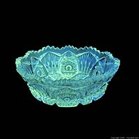 Bowl glowing green under UV showing manganese fluorescence