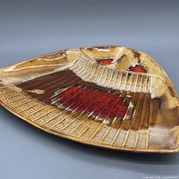 Oblique view showing textured surface and red center