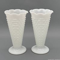Pair of white hobnail milk glass vases full view