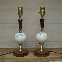 Front view of both lamps showing overall design and materials