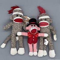 All three sock monkeys front view