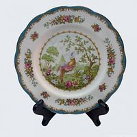 Front view of the Royal Albert Chelsea Bird plate on stand