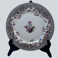 Full front view of Royal Bayreuth dinner plate on stand