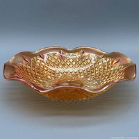 Side view showing ruffled edge and iridescent finish