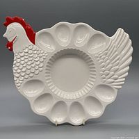 Front view of hen-shaped Teleflora ceramic egg platter showing overall design and color