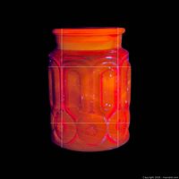 Front view of amberina Stars & Moon glass canister