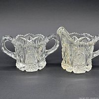 Cremer and sugar bowl side-by-side front view