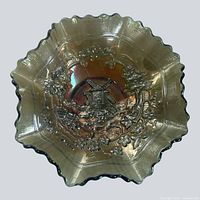 Top view showing full bowl, ruffled edge and iridescent finish