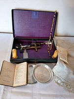 Complete set displayed with case open showing all components