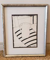 Full view of framed minimalist ink drawing