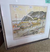 Frontal view of framed print showing image detail and signature