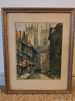 Full view of framed lithograph