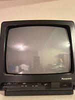 Front view of Panasonic CRT television showing screen and control panel