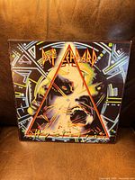 Front jacket artwork of Def Leppard “Hysteria” LP