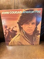 Front cover showing title and artist