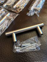 One handle with screw packet close-up