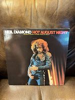 Front gatefold cover of Neil Diamond Hot August Night