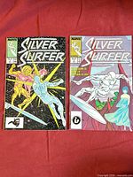 Front covers of Silver Surfer issues #2 and #3