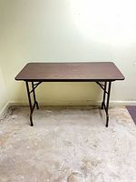 Full view of folding table top and legs