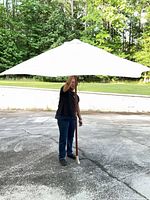 Umbrella fully opened outdoors showing canopy size and color