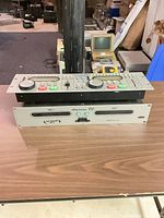 main chassis with controller stacked on top showing overall system