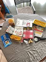 Overview of all kitchen gadgets spread on table