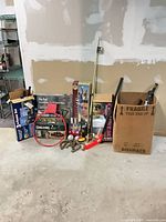 Full view of lot with boxed games, racquets, horseshoes and accessories