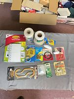Overhead view showing all packaged hardware and cord spools