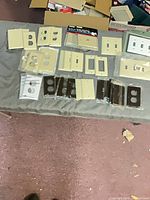 Group view of all wall plates arranged on table