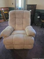 front view showing upholstery, cushions and overall condition