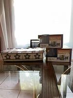 Entire lot showing caddy with ceramic inserts, two Belagio boxes behind
