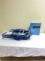 Coiled blue LED rope light with box